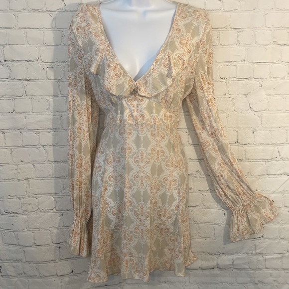 Free People Dresses & Skirts - Free People flirty beige open back dress